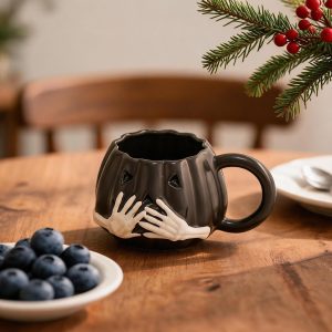 Black Pumpkin Ceramic Mug with Skeleton Hands